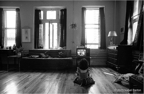 Mariana Watches Television, 1976 (© 2023 Isabel Barton)