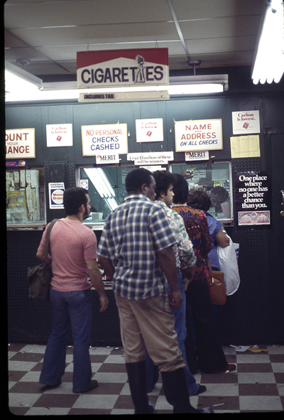 Check cashing place on Spring between Crosby and Lafayette (1977)