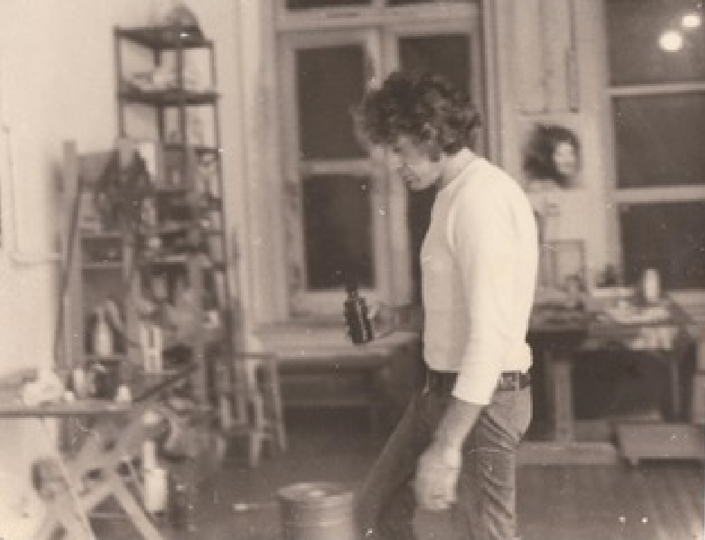 This is my father, George Kokines, painting in his loft on Greene Street, between Prince and Broome West side of street)) probably somewhere 1971-3-ish.  Of course he lived there, too.  He built a loft bedroom on a platform with stairs up to it, a kitchen, and  a bathroom, and painted the floors.