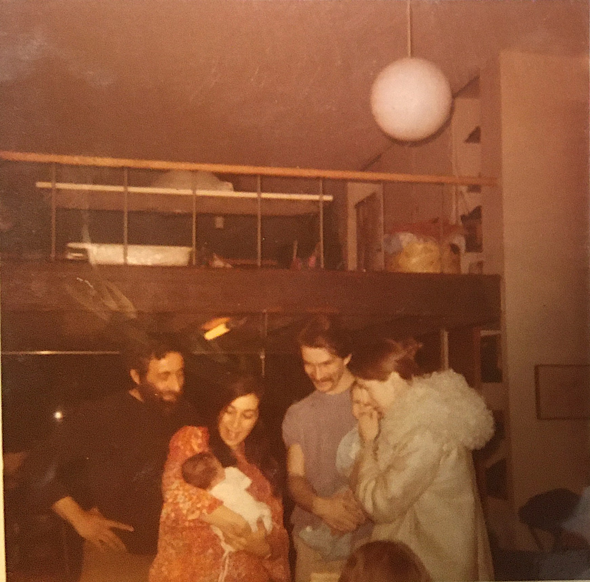 Loft parents showing off babies inside 16 Greene St., 1971.