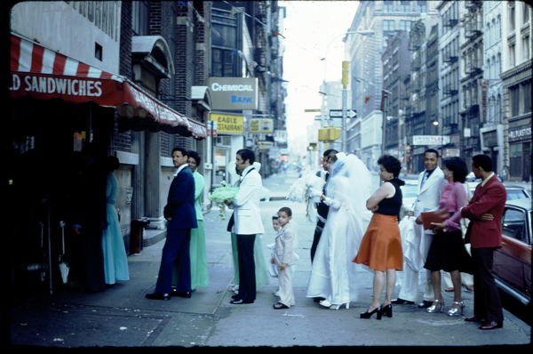 Wedding party entering a restaurant on Broadway near Spring, 1975. The building across the street that says “Eagle Restaurant” is where the Nike Store is today.