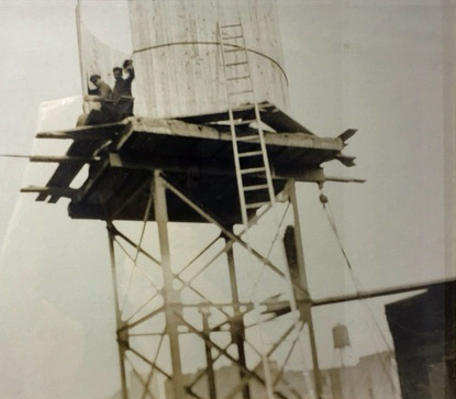 Isseks Brothers water tank being constructed on a New York City Rooftop back in the early days