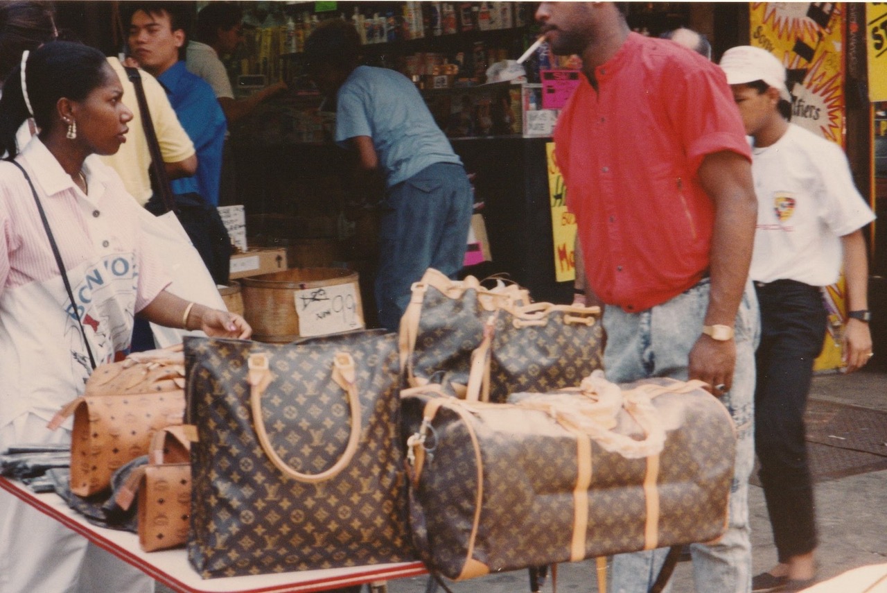Handbag vendors selling knockoff handbags on Canal Street Lower